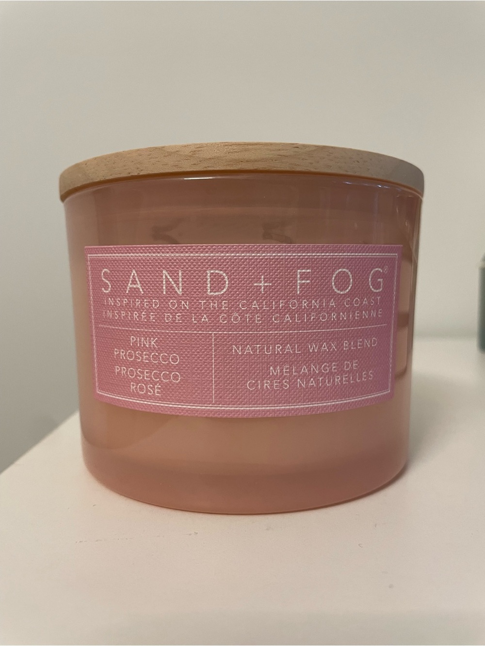 SAND + FOG Pink Prosecco Scented Candle - Pink glass jar with wooden lid